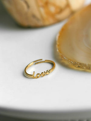 Gold love ring