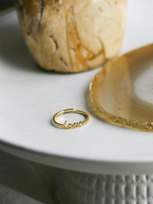 Gold love ring