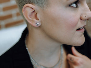 Clous d'oreilles Christina